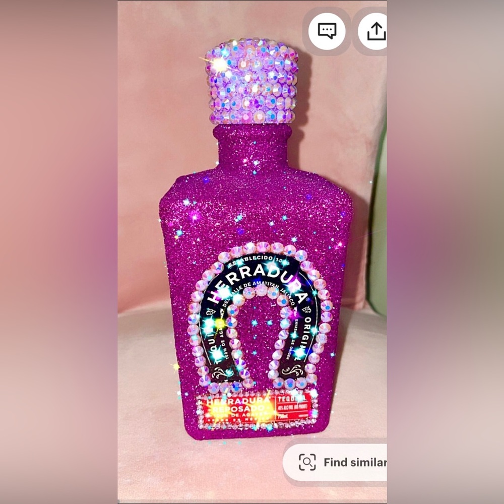 Empty bedazzled herradura reposado bottle